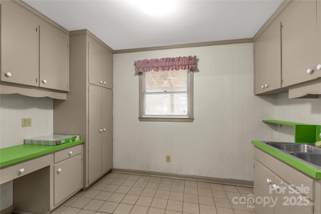 kitchen with sink and light tile patterned flooring