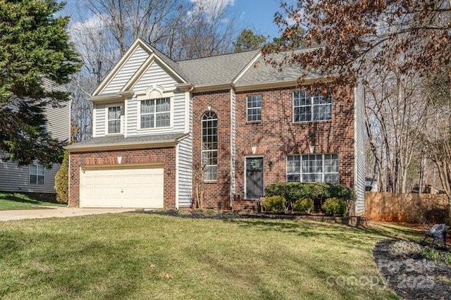 view of front of house with a garage and a front yard