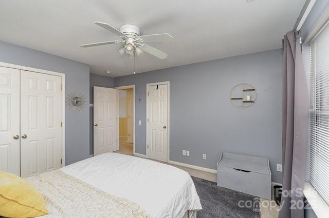 carpeted bedroom featuring ceiling fan