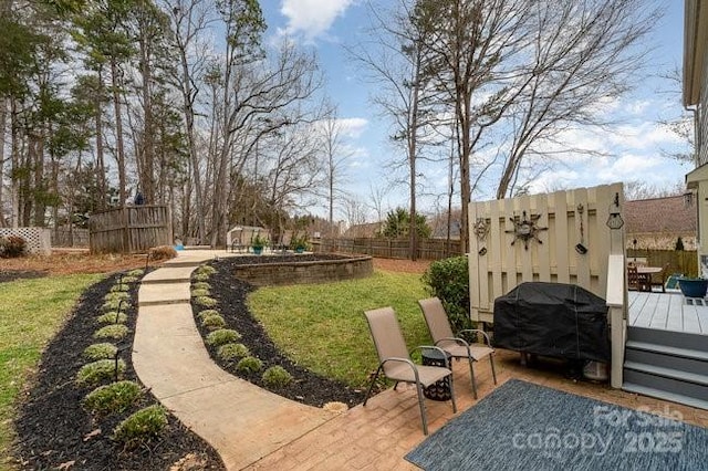 view of yard featuring a deck