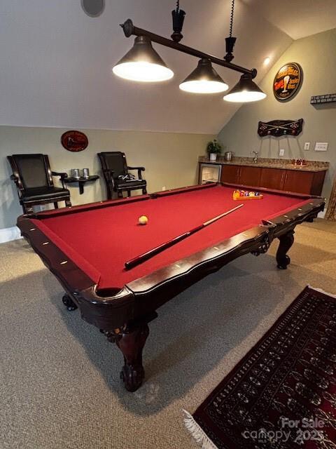 rec room with lofted ceiling, carpet, and pool table