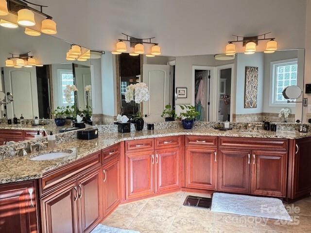 bathroom featuring vanity and tile patterned flooring