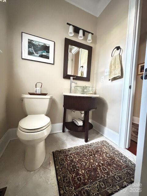 bathroom featuring toilet