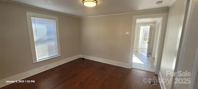 empty room with dark wood-type flooring, crown molding, and a healthy amount of sunlight