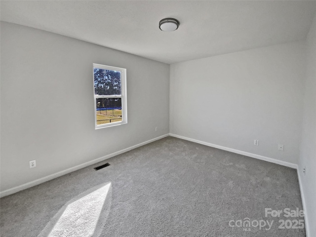 view of carpeted spare room