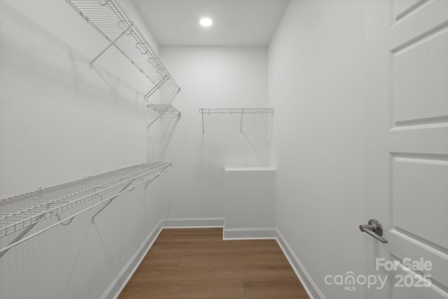 8078 Blackwood Rd, Denver, NC 28037 - spacious closet featuring dark wood-style floors