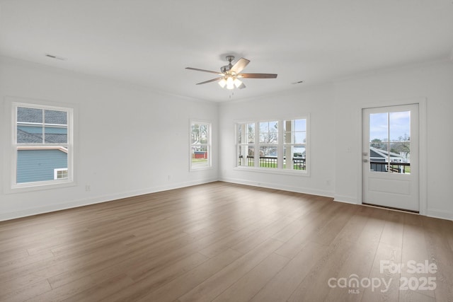 8078 Blackwood Rd, Denver, NC 28037 - unfurnished room with ceiling fan, dark wood finished floors, ornamental molding, and baseboards