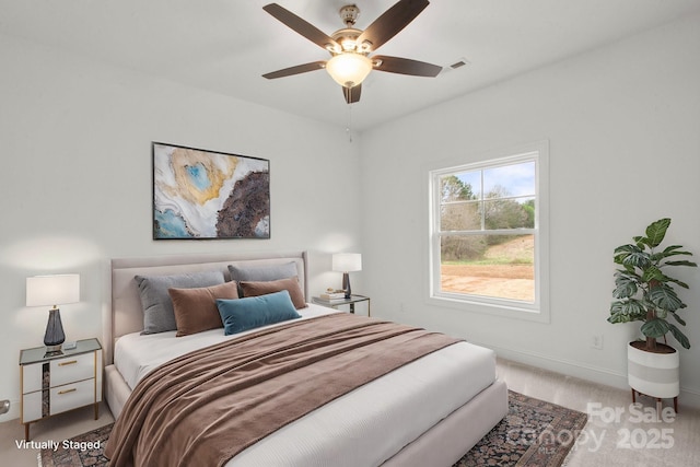 8078 Blackwood Rd, Denver, NC 28037 - carpeted bedroom with baseboards and a ceiling fan