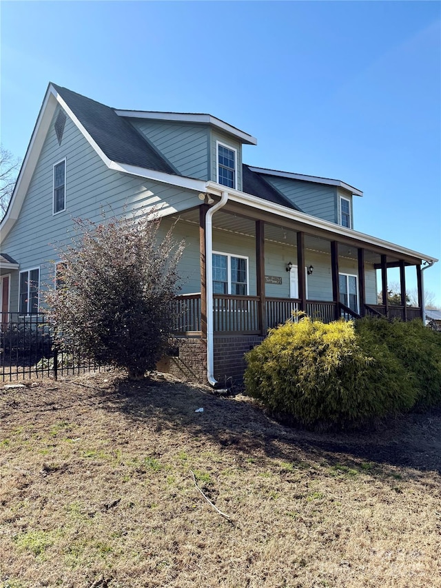 view of front of home featuring covered porch