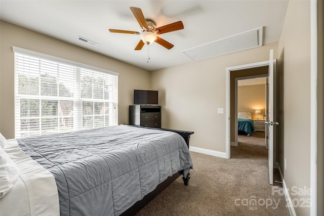 carpeted bedroom with ceiling fan