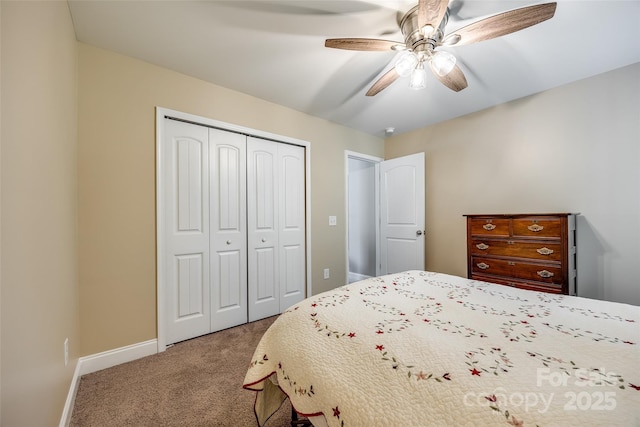 bedroom with ceiling fan, a closet, and carpet flooring