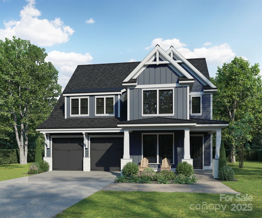 craftsman-style home with covered porch, a garage, concrete driveway, a front lawn, and board and batten siding