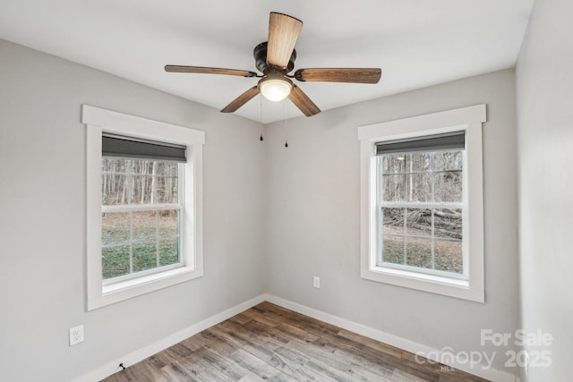 unfurnished room featuring ceiling fan and light hardwood / wood-style flooring