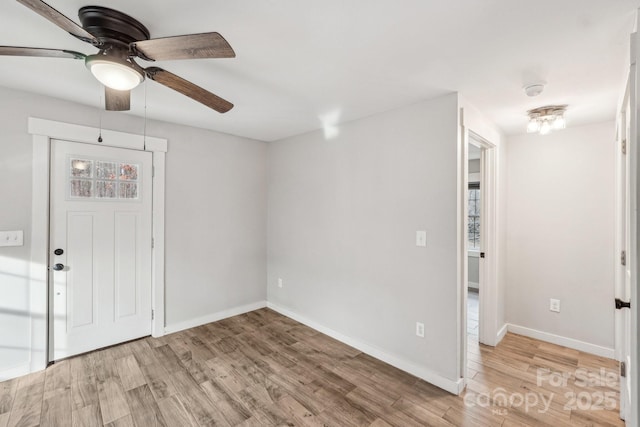 entryway featuring ceiling fan and light hardwood / wood-style floors