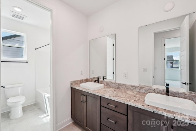 604 Hyder Trl, Tega Cay, SC 29708 - bathroom with toilet, tile patterned floors, baseboards, double vanity, and  shower combination