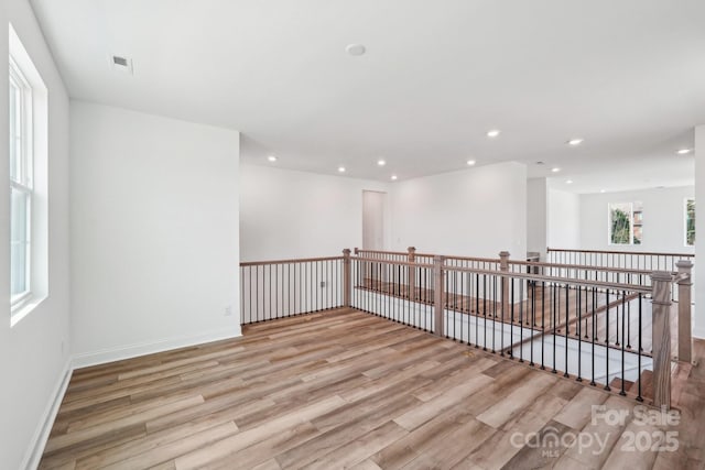 604 Hyder Trl, Tega Cay, SC 29708 - unfurnished room with light wood finished floors and recessed lighting