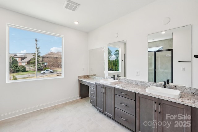 604 Hyder Trl, Tega Cay, SC 29708 - bathroom featuring double vanity, a shower stall, and tile patterned flooring