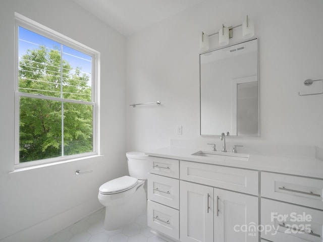 2534 Weddington Ave Unit 11, Charlotte, NC 28204 - bathroom featuring vanity, toilet, and tile patterned floors
