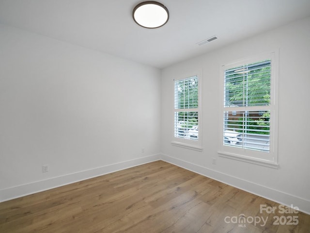 2530 Weddington Ave Unit 12, Charlotte, NC 28204 - empty room with baseboards and light wood finished floors