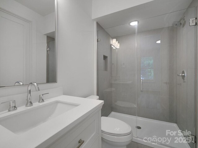 2530 Weddington Ave Unit 12, Charlotte, NC 28204 - full bath with toilet, a stall shower, and vanity