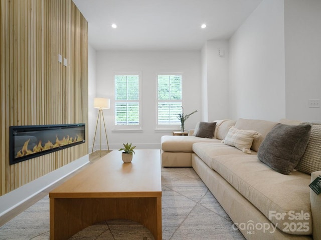 2530 Weddington Ave Unit 12, Charlotte, NC 28204 - living area featuring a glass covered fireplace, recessed lighting, and baseboards