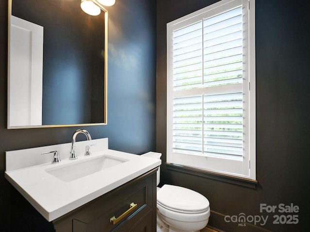 2530 Weddington Ave Unit 12, Charlotte, NC 28204 - half bathroom featuring toilet and vanity