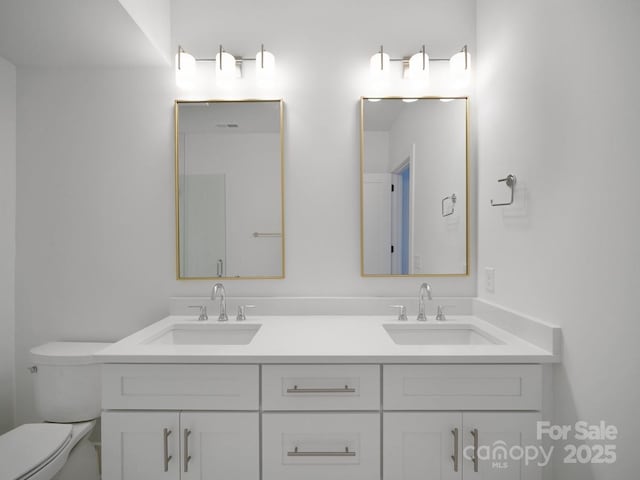 2530 Weddington Ave Unit 12, Charlotte, NC 28204 - bathroom with toilet and double vanity