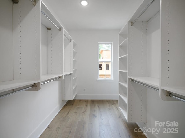 2530 Weddington Ave Unit 12, Charlotte, NC 28204 - walk in closet with light wood-type flooring