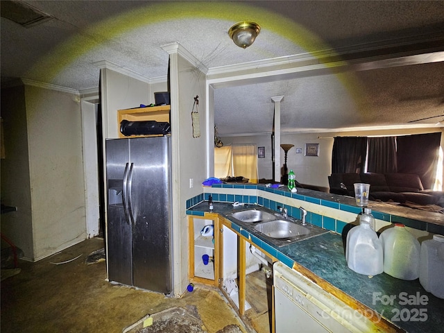 kitchen with sink, fridge with ice dispenser, ornamental molding, and concrete flooring