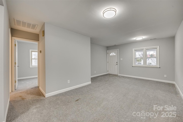 view of carpeted spare room