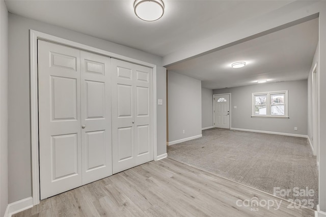 basement with light colored carpet