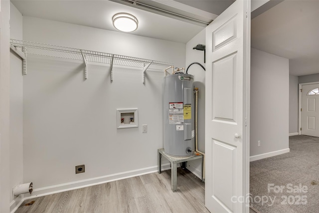 laundry area with washer hookup, electric water heater, and hookup for an electric dryer