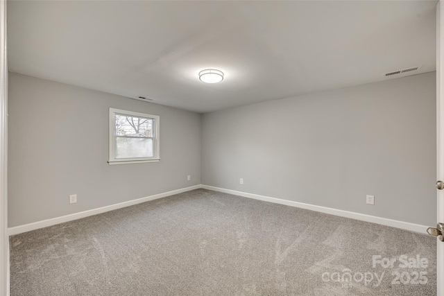 view of carpeted spare room