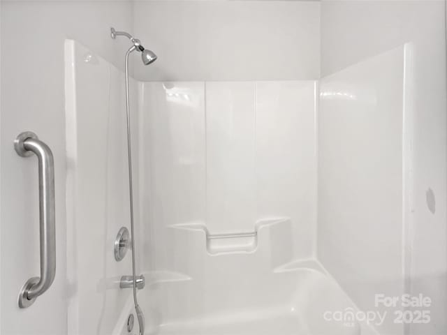 bathroom featuring walk in shower