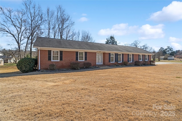 ranch-style house with a front yard