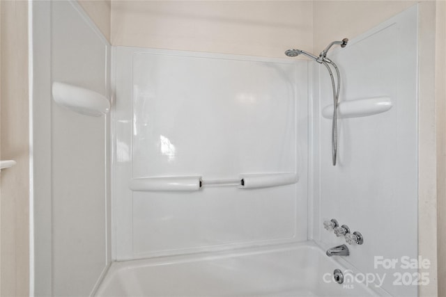 bathroom with shower / bathtub combination