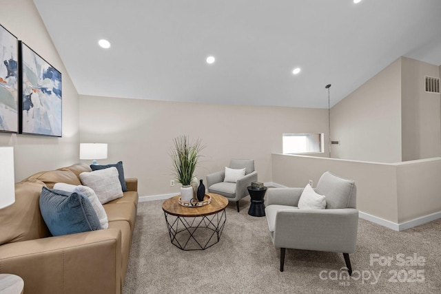 living area featuring vaulted ceiling, recessed lighting, carpet, and baseboards