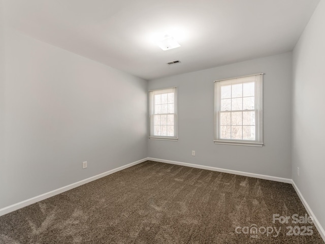 view of carpeted spare room