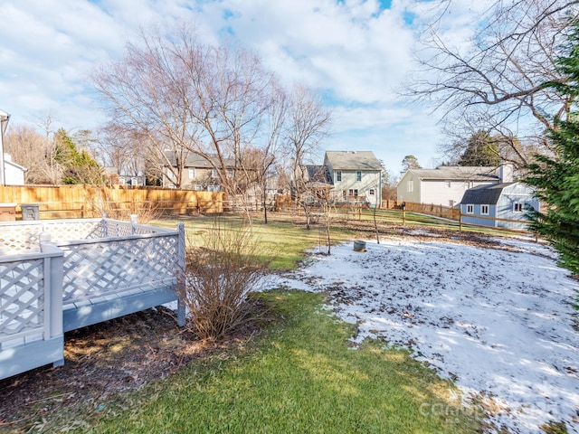 view of yard covered in snow