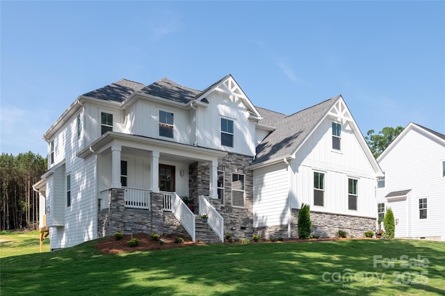 4257 Candlewood Dr Unit 7, Sherrills Ford, NC 28673 - view of front facade featuring board and batten siding, a front yard, a porch, stone siding, and stairs