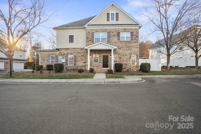 view of front of property featuring a garage