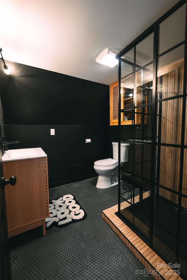 bathroom featuring sink and toilet