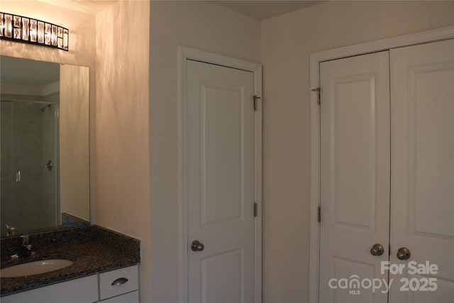 bathroom featuring vanity and walk in shower