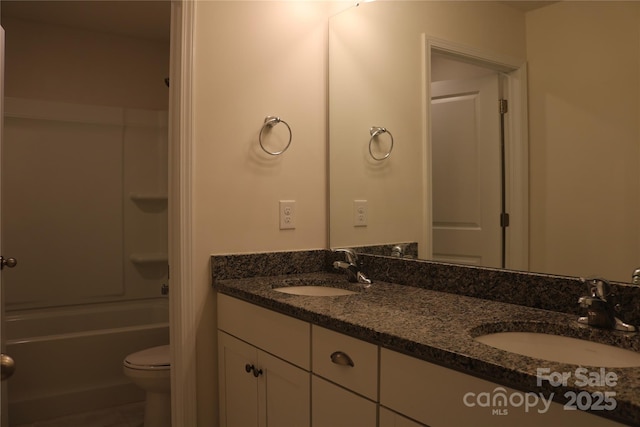 full bathroom featuring toilet, vanity, and shower / bath combination