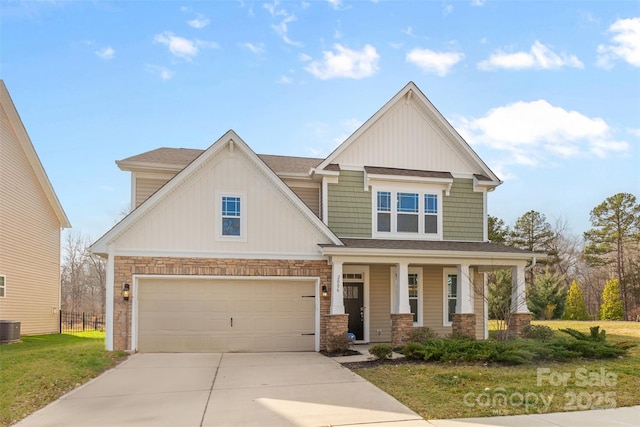 craftsman house featuring central AC, a porch, a garage, and a front yard