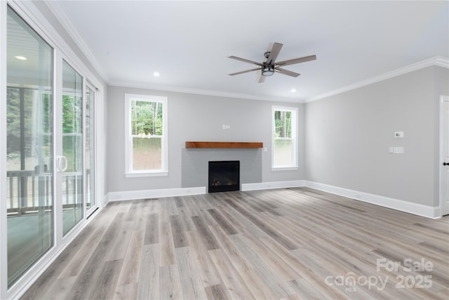 4251 Candlewood Dr, Sherrills Ford, NC 28673 - unfurnished living room with a fireplace, light wood-type flooring, healthy amount of natural light, ceiling fan, and crown molding