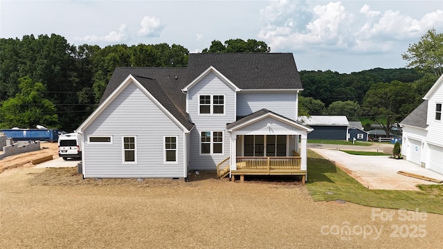 4251 Candlewood Dr, Sherrills Ford, NC 28673 - back of house featuring crawl space, a view of trees, and roof with shingles