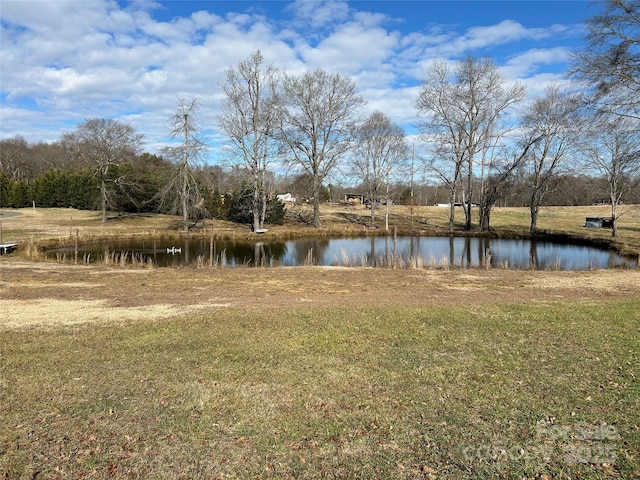 view of yard with a water view