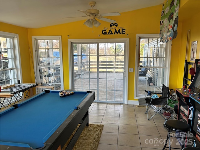 playroom featuring pool table, light tile patterned floors, and ceiling fan