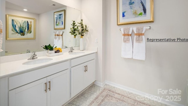 bathroom with vanity and tile patterned flooring